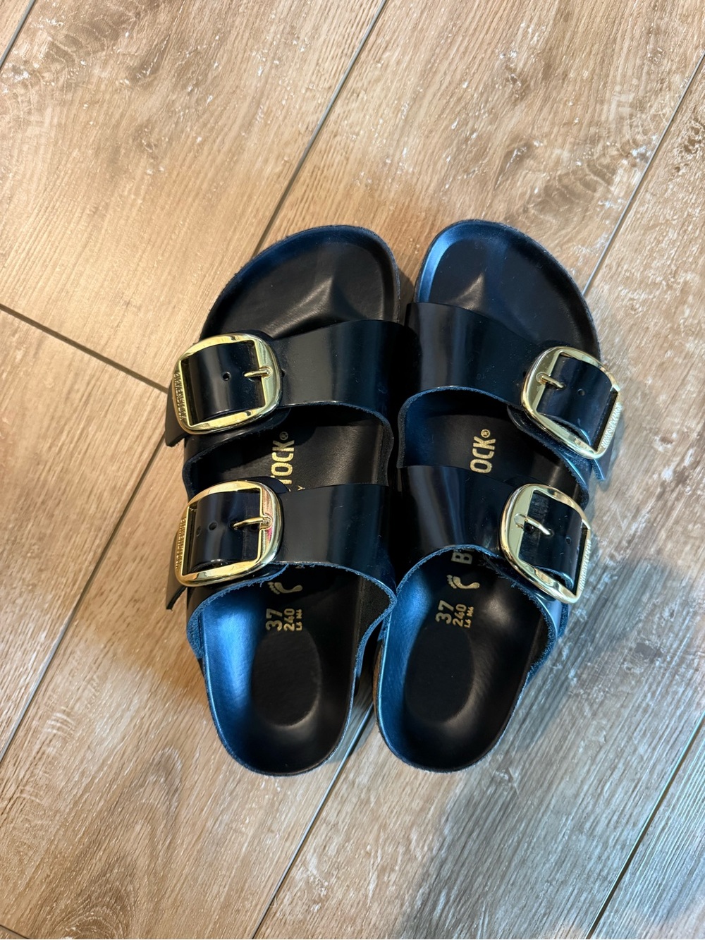 Birkenstock Black Sandals with Gold Buckles